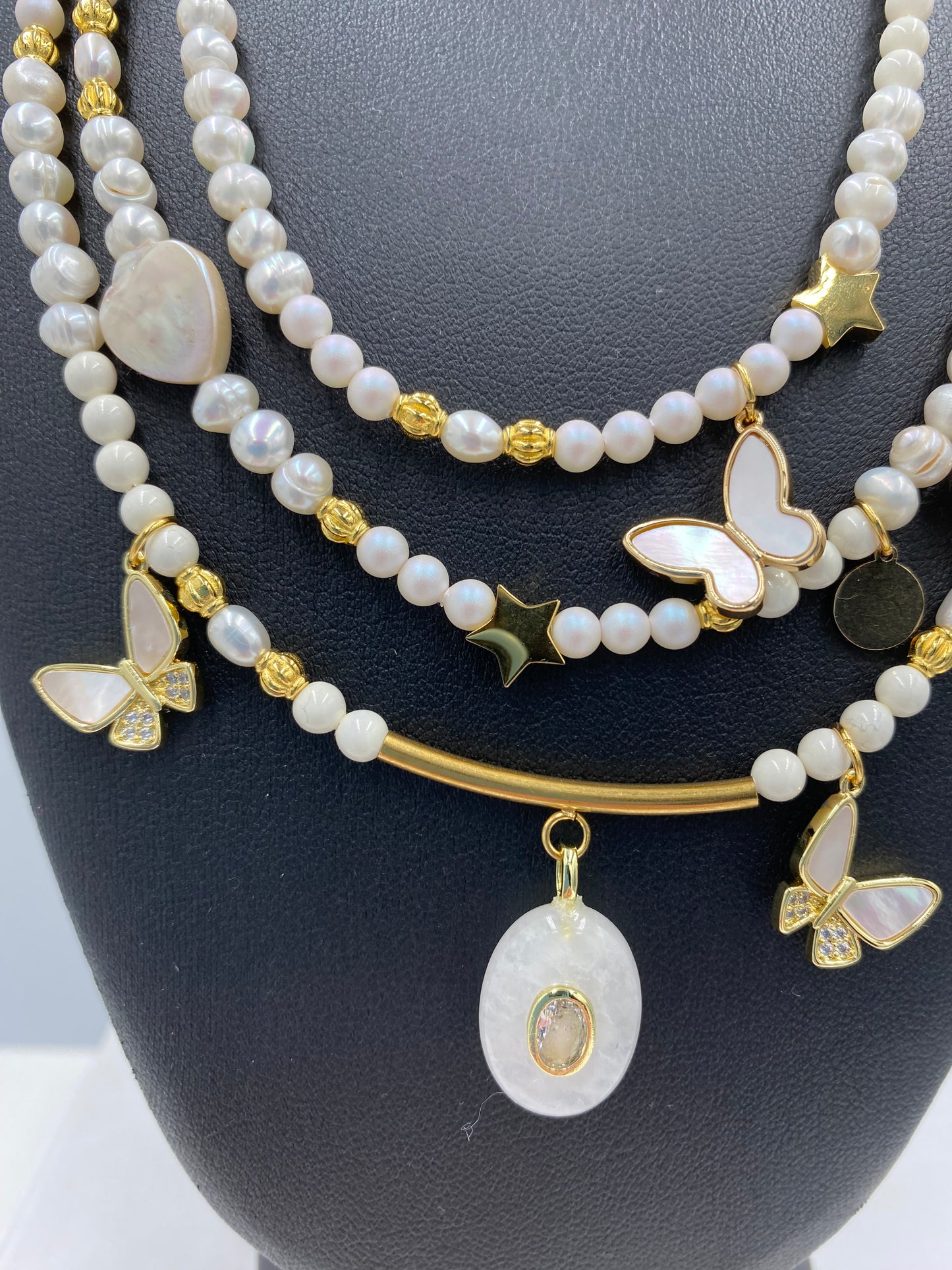 Collier 3 rangs « ivoire » papillons.