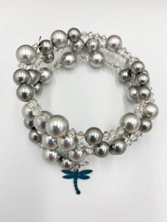 Bracelet «spirale» gris argenté.